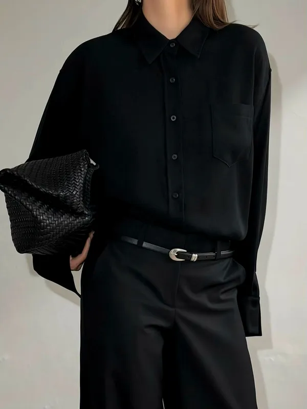 เสื้อเชิ้ตสีดำคลาสสิก - เรียบหรูและทันสมัยเหมาะสำหรับทุกโอกาส