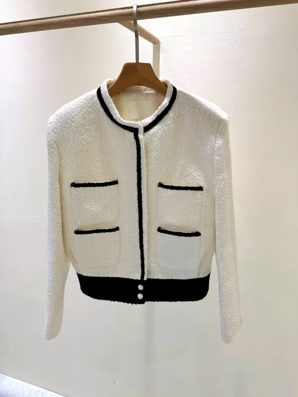 Elegant and Stylish Women's Jacket with Classic Black and White Design