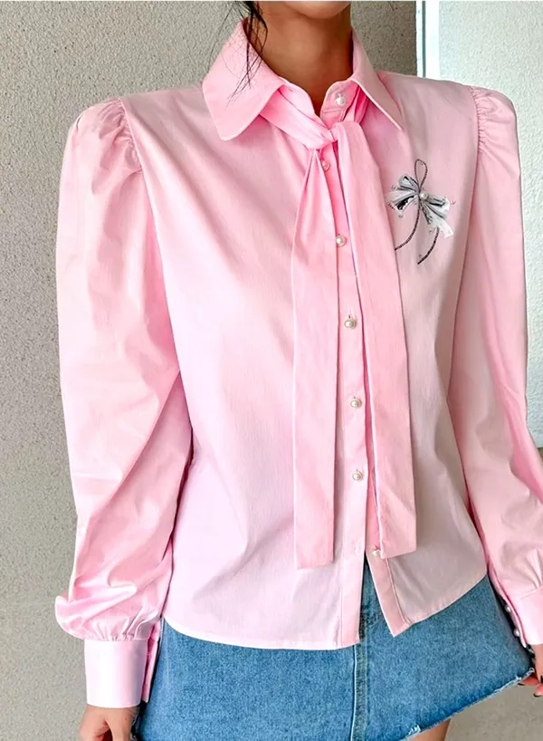 Elegant Pink Shirt with Bow Design