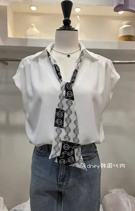 Minimalist White Shirt with Black and White Scarf