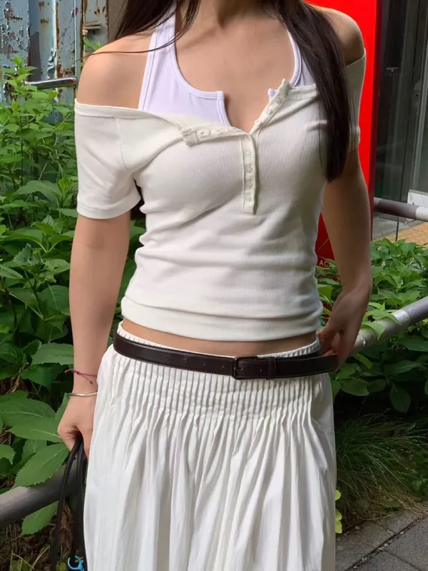 Stylish White Off-Shoulder Top Paired with a Simple Pleated Skirt