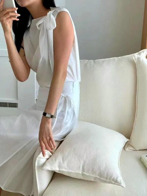 Elegant and Minimalist Women's Top with Fresh White Design