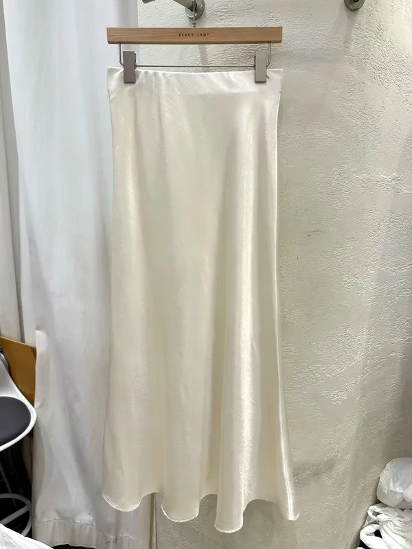 Elegant Silky Women's Midi Skirt, Showcasing Charming Curves
