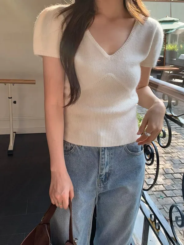 Elegant Knit Sweater - Fresh and Versatile, Showcasing Women's Charm