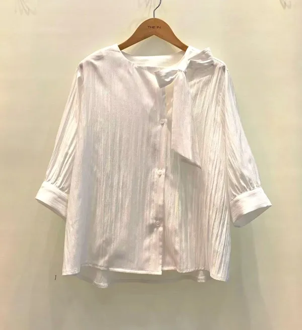 Fresh and Elegant Women's Top with Lightweight Breathable Design