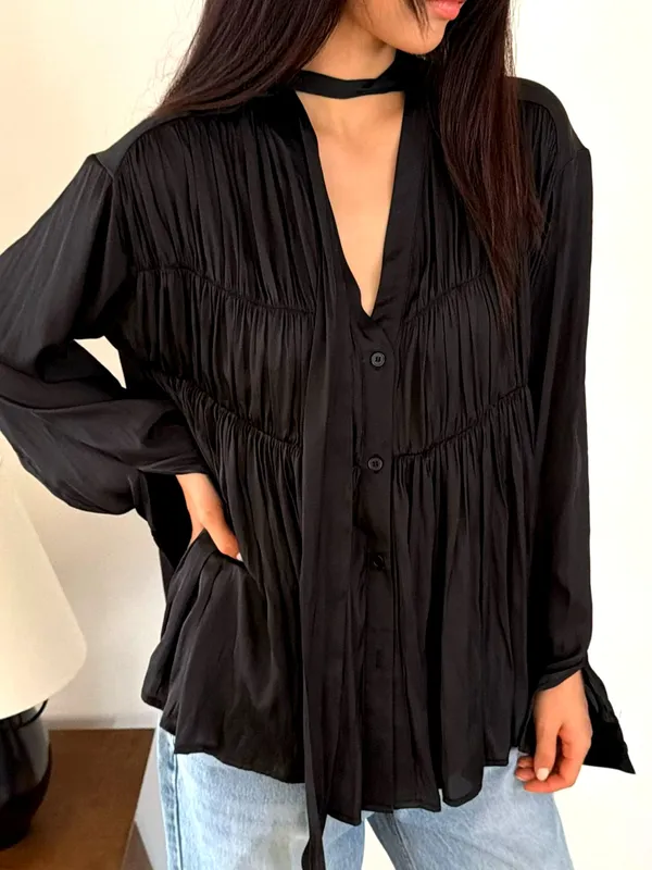 Elegant Black Women's Top with Flowing Pleat Design