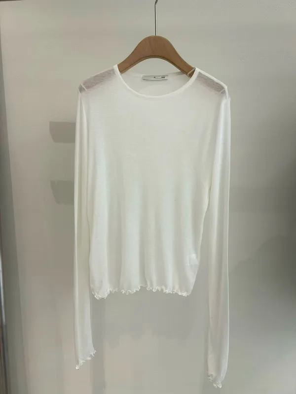 Fresh White Long Sleeve Top with Elegant Breathable Design