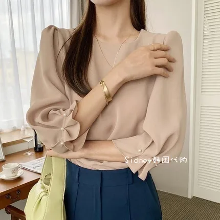 Elegant Pearl Sleeve Top for a Chic Look