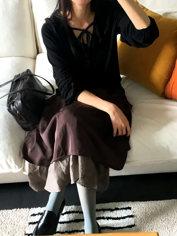 Elegant and Minimalist Black Top with Ties