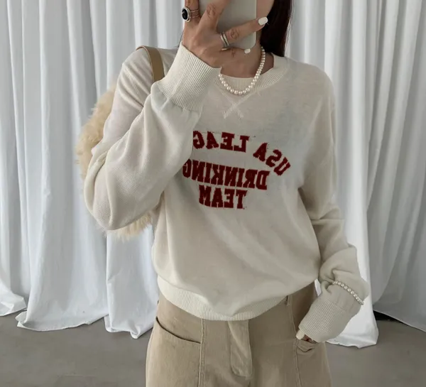 Fashionable and Comfortable Knitted Sweater, Showcasing Elegant Charm