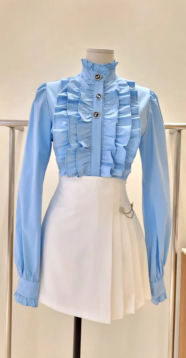 Elegant Blue Ruffled Top, Showcasing Feminine Charm