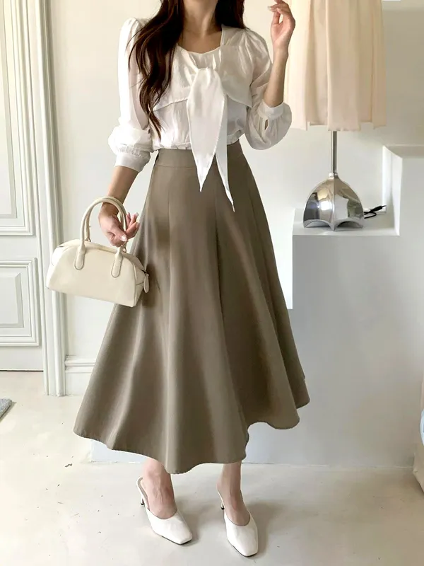 Elegant Women's Midi Skirt with Flowing Hem, Perfect for Any Occasion