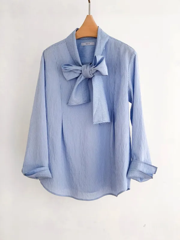 Elegant Striped Women's Top with Fashionable Bow Design