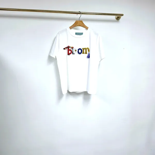 Stylish White T-Shirt with Embroidered Letters - Perfect for Any Occasion
