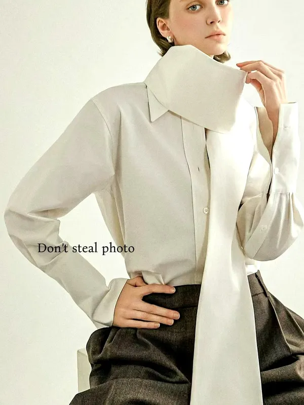 เสื้อเชิ้ตสีขาวเรียบหรู สวมใส่ได้หลากหลาย
