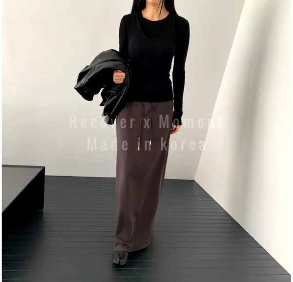 Elegant Minimalist Black Maxi Dress, Showcasing Feminine Charm