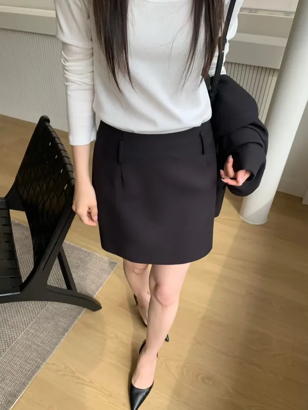 Elegant and Minimalist Black Dress for Women, Showcasing Charming Qualities