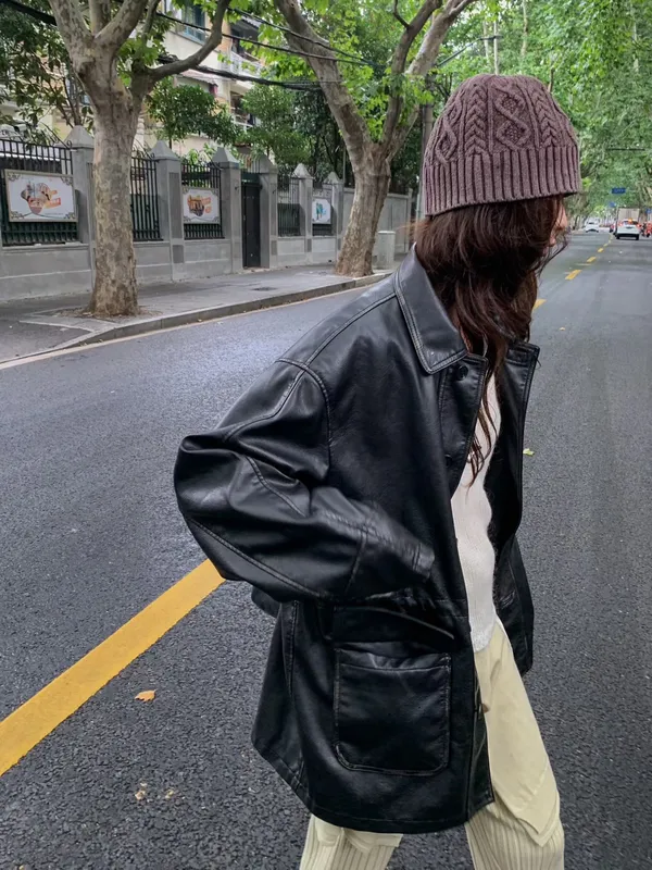 Stylish Versatile Women's Jacket with Elegant Black Leather Design