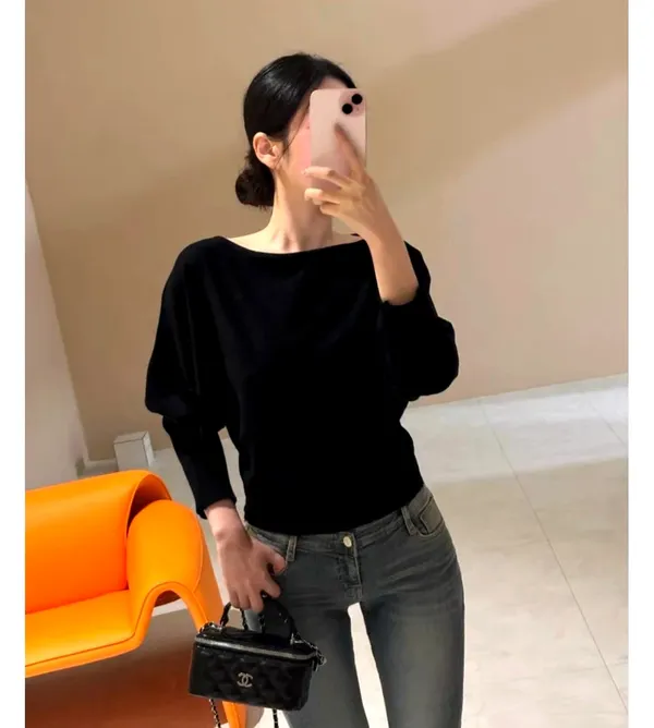 Stylish and Minimalist Black Women's Top - Comfortable and Versatile