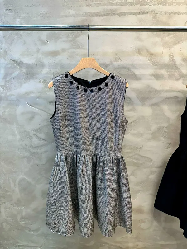 Elegant Women's Dress with Classic Black and White Plaid Design