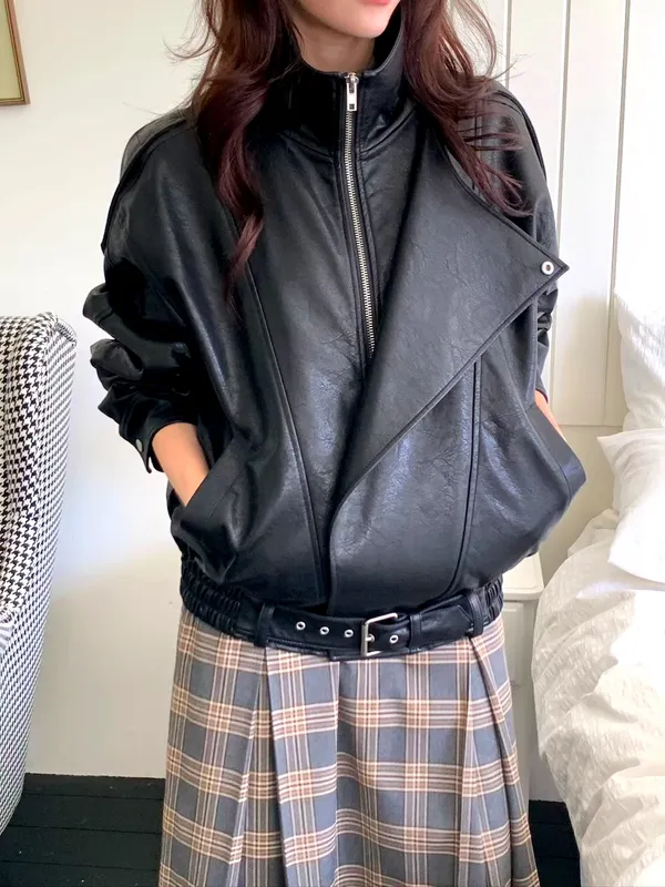 Stylish Black Women's Jacket with Unique Zipper Design