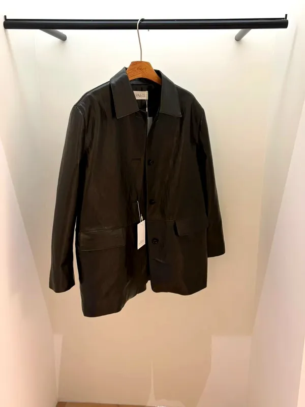 Stylish Black Women's Coat, Elegant and Minimalist Design