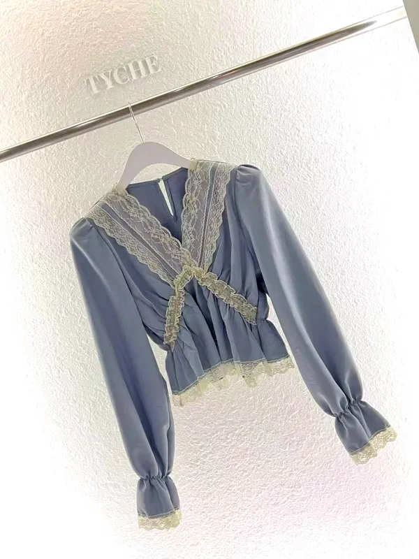 Elegant Lace-Trimmed Women's Top, Showcasing Charming Elegance