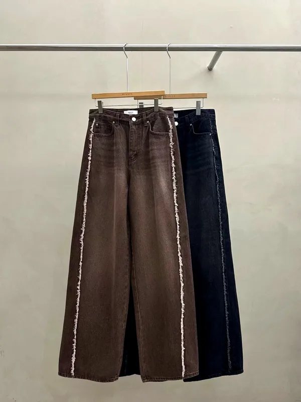 Stylish Loose-Fit Women's Jeans with Unique Edge Design