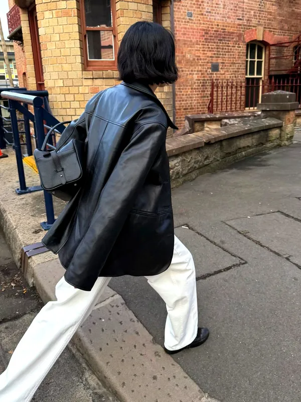 Fashionable and Minimalist Women's Jacket with Elegant Black Design