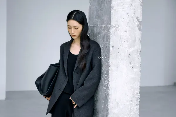 Elegant and Stylish Women's Coat, Classic Cut for Perfect Pairing