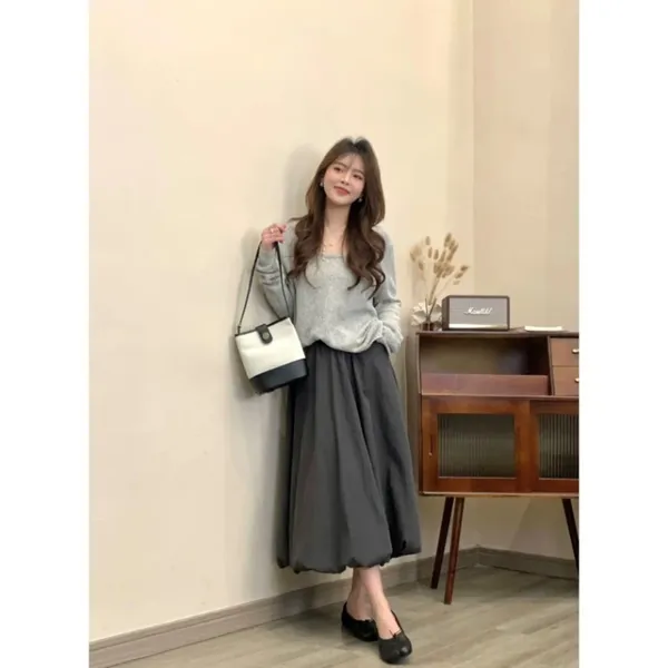 Elegant Gray Maxi Dress Paired with Casual Top