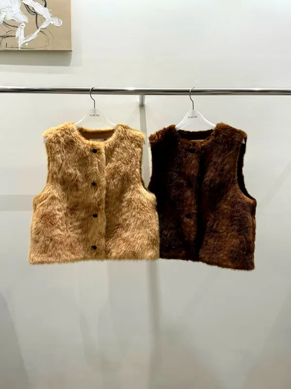 Fashionable plush women's top, warm and comfortable, suitable for autumn and winter matching.