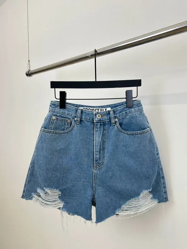 Stylish Ripped Denim Shorts - A Summer Essential