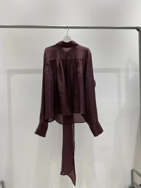 Elegant and Flowing Burgundy Shirt for Various Occasions