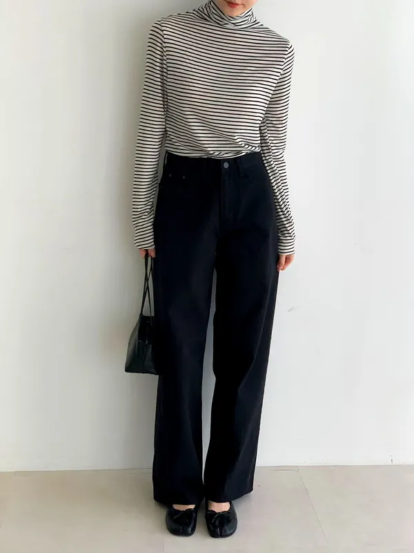Fashionable Striped Turtleneck Sweater Paired with Classic Black Pants