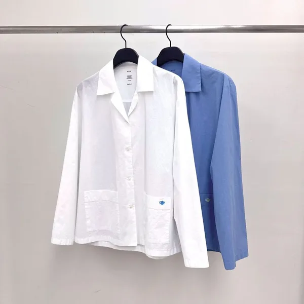 Fresh and Minimalist White Shirt Perfect for Spring and Summer Outfits