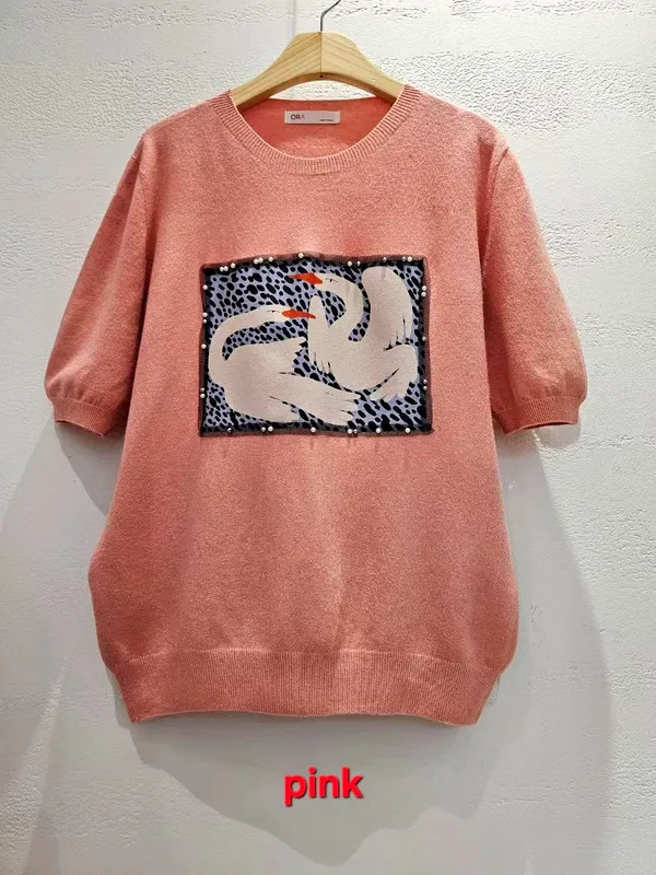 Stylish Pink Sweater with Elegant Floral Design, Perfectly Versatile