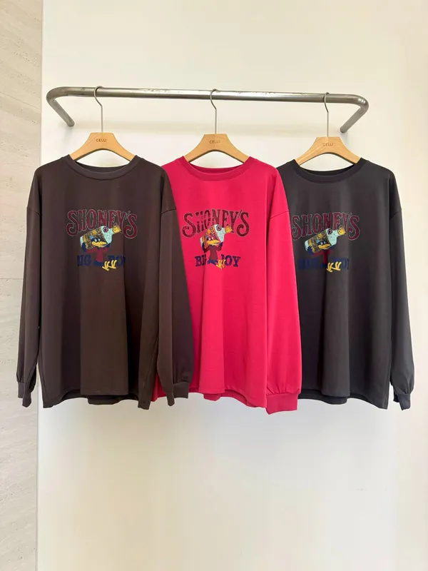 Trendy Loose-Fit Long Sleeve Top with Unique Prints