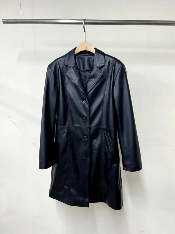 Stylish Black Leather Jacket, Exuding Elegance