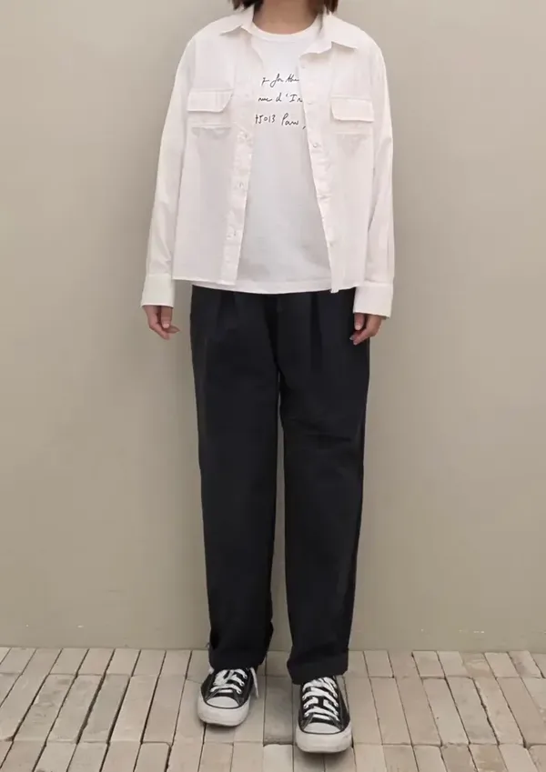 Minimalist White Shirt Paired with Casual Pants
